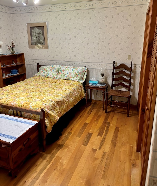 bedroom featuring hardwood / wood-style flooring