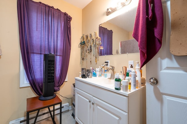 bathroom featuring vanity and a baseboard radiator