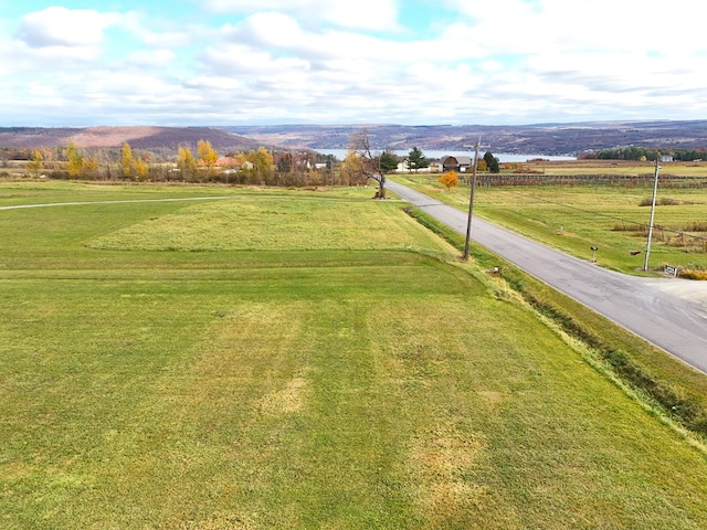 view of home's community featuring a mountain view and a rural view