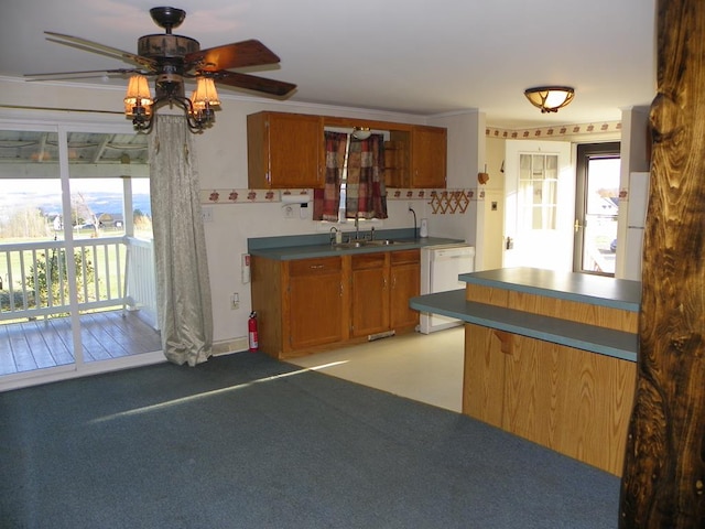 kitchen featuring light carpet, sink, dishwasher, and ceiling fan