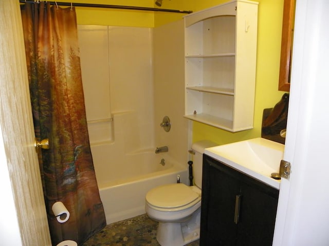 full bathroom featuring vanity, shower / bathtub combination with curtain, and toilet