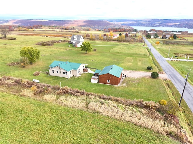 bird's eye view featuring a rural view and a mountain view