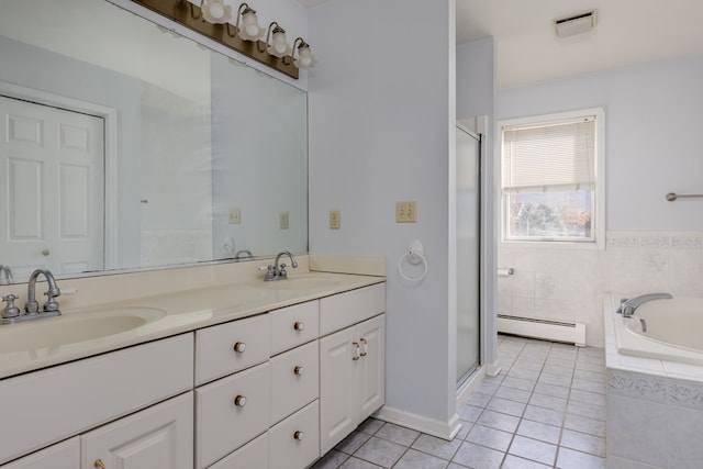 bathroom featuring tile patterned flooring, vanity, plus walk in shower, and baseboard heating