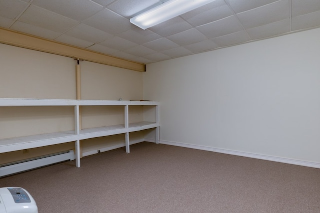 storage room featuring baseboard heating