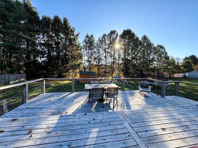 wooden deck with a yard