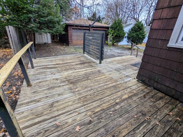 wooden deck featuring a storage shed