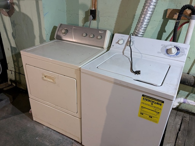 laundry area with separate washer and dryer