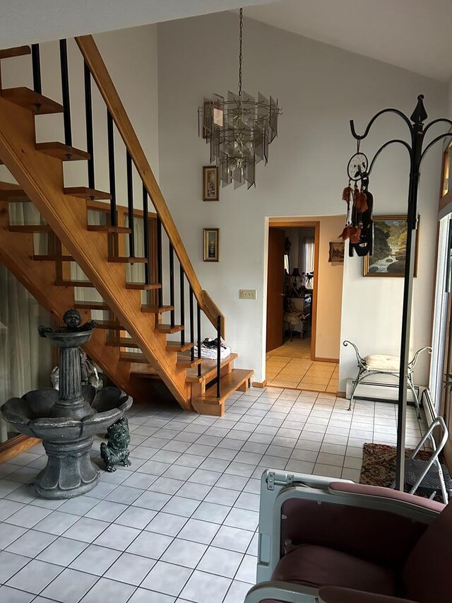 interior space with light tile patterned floors and a chandelier