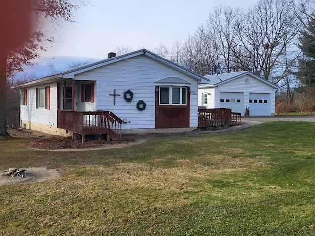 view of front facade featuring a front lawn and a garage