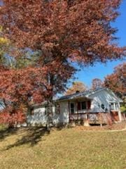 view of front of property with a front lawn