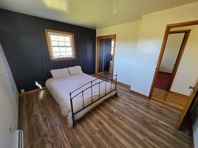 bedroom featuring dark hardwood / wood-style floors