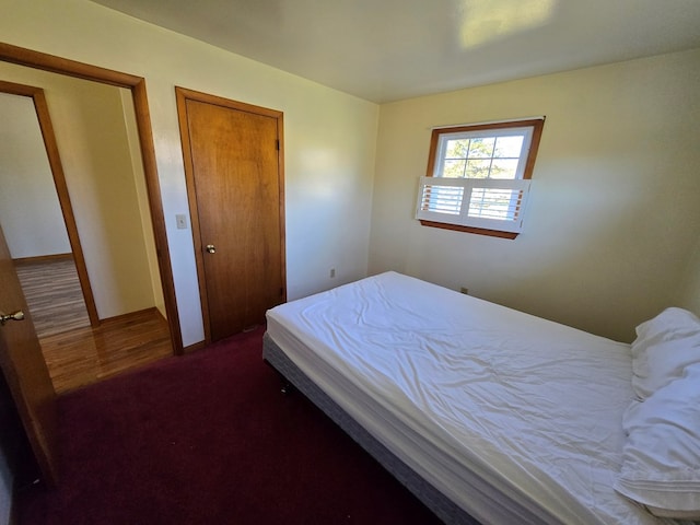 bedroom featuring dark hardwood / wood-style floors