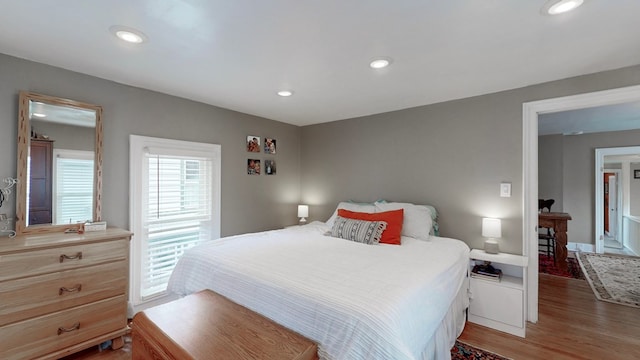 bedroom featuring hardwood / wood-style floors