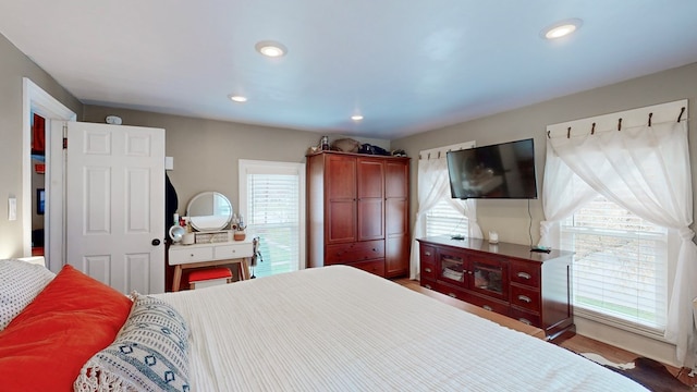 bedroom with wood-type flooring