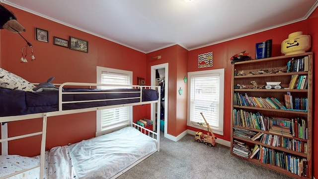 bedroom with carpet flooring and ornamental molding