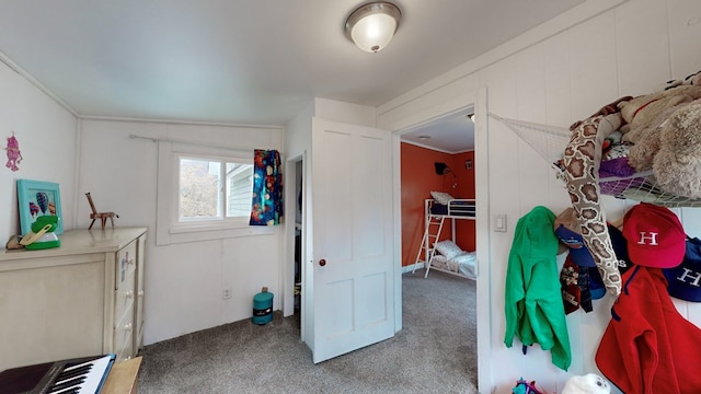 bedroom featuring carpet