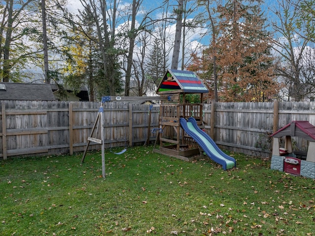 view of playground with a yard