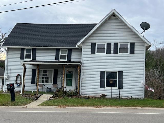 front of property with a porch