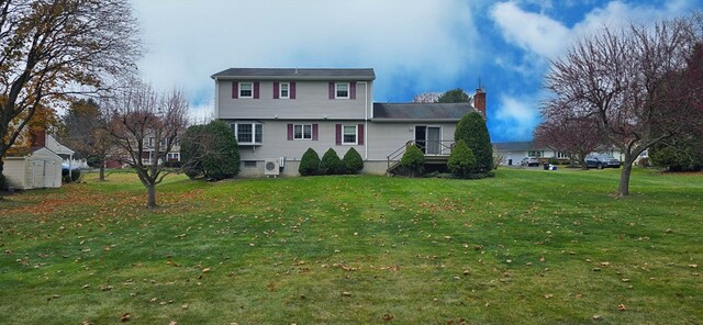 view of property with a front lawn