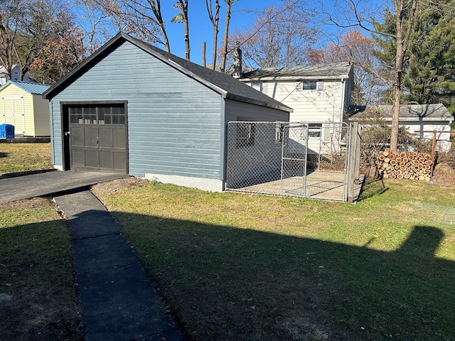 garage featuring a yard