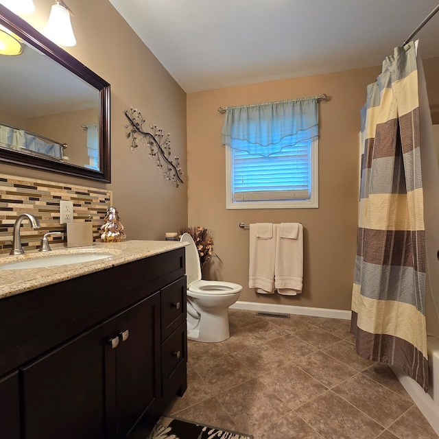 bathroom featuring backsplash, tile patterned floors, vanity, toilet, and curtained shower