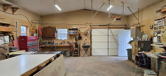 garage featuring a workshop area