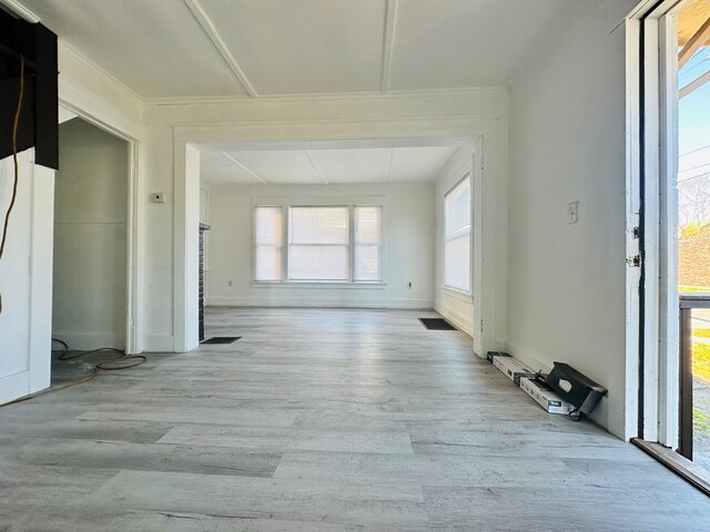 unfurnished room featuring light hardwood / wood-style flooring