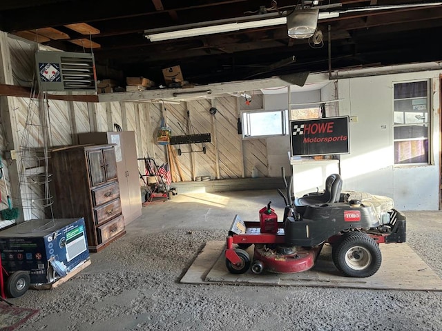 garage featuring wooden walls