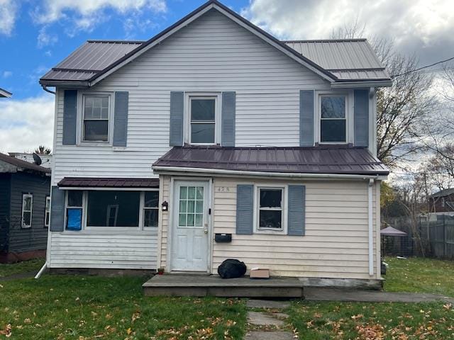 view of front facade with a front lawn