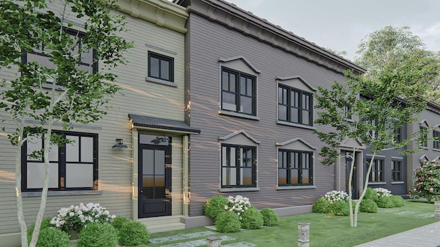 view of front of home featuring a front lawn