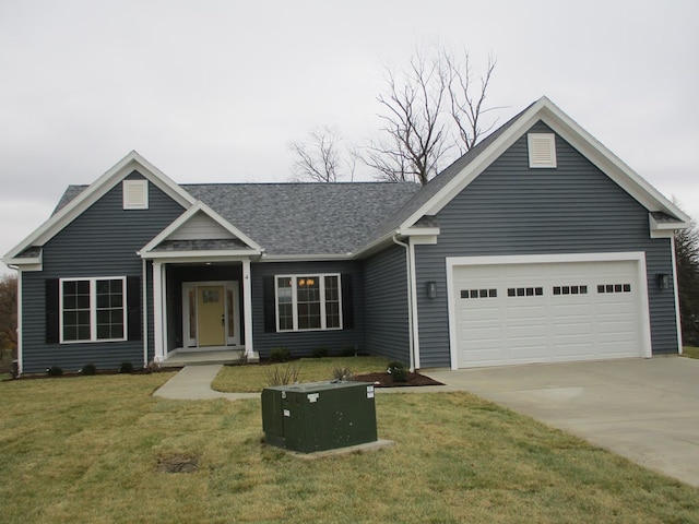 view of front facade featuring a garage and a front lawn