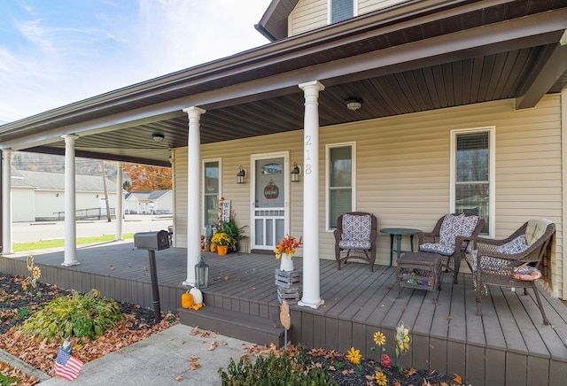 deck with covered porch