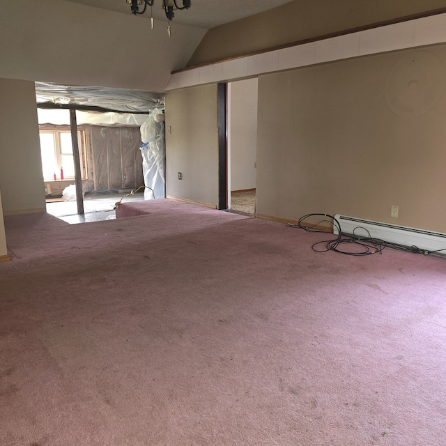 basement with light carpet and a baseboard radiator