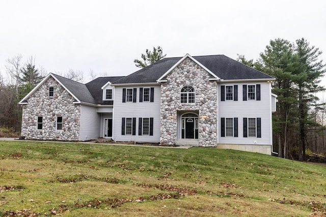 view of front of home with a front lawn