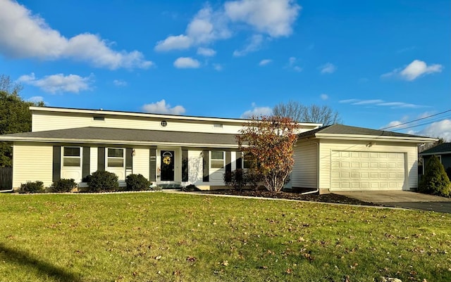 single story home featuring a garage and a front yard