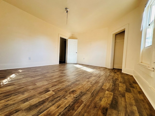 empty room featuring dark hardwood / wood-style floors