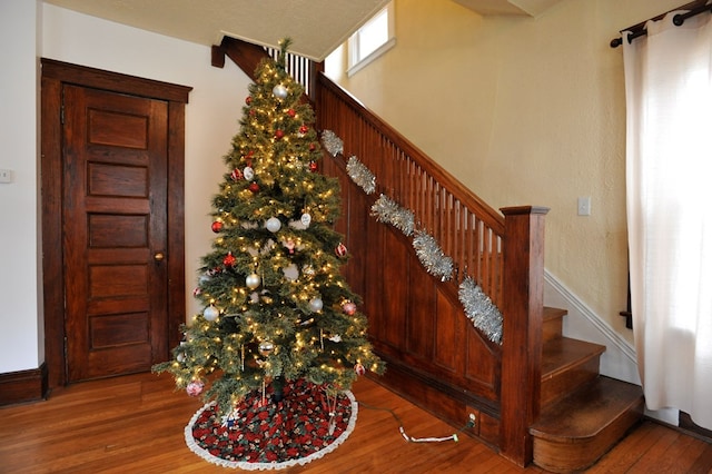 stairs with wood-type flooring