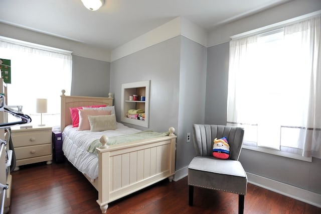 bedroom featuring dark hardwood / wood-style floors