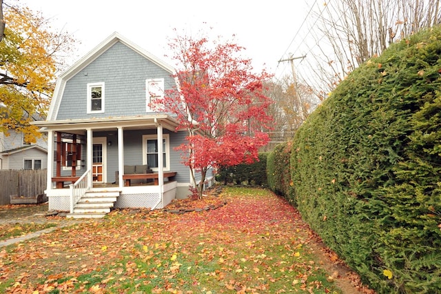 view of front of home featuring covered porch