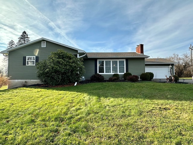 single story home featuring a garage and a front lawn