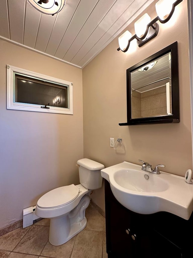 bathroom with lofted ceiling, vanity, a baseboard heating unit, toilet, and wooden ceiling