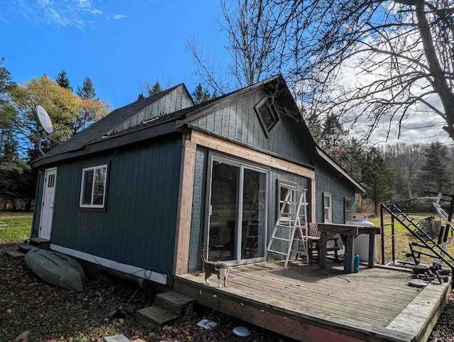 view of property exterior featuring a deck