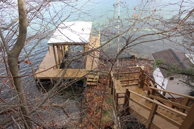 view of home's exterior with a water view