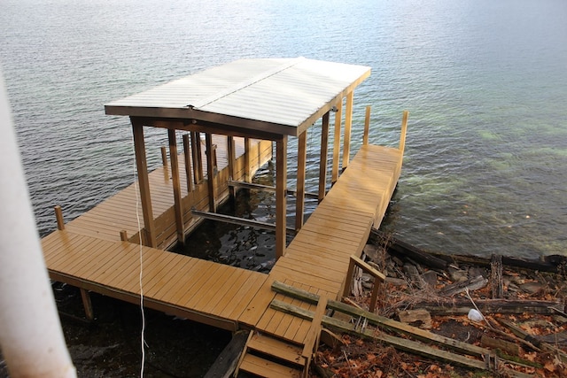 dock area featuring a water view