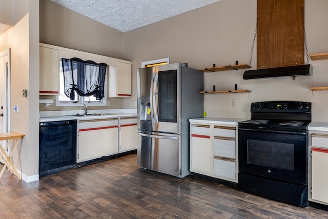 kitchen featuring dark hardwood / wood-style flooring, a textured ceiling, sink, black appliances, and white cabinetry