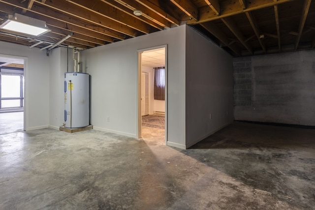 basement featuring electric water heater