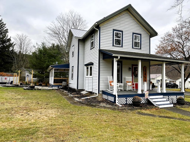 view of front of property with a porch and a front lawn