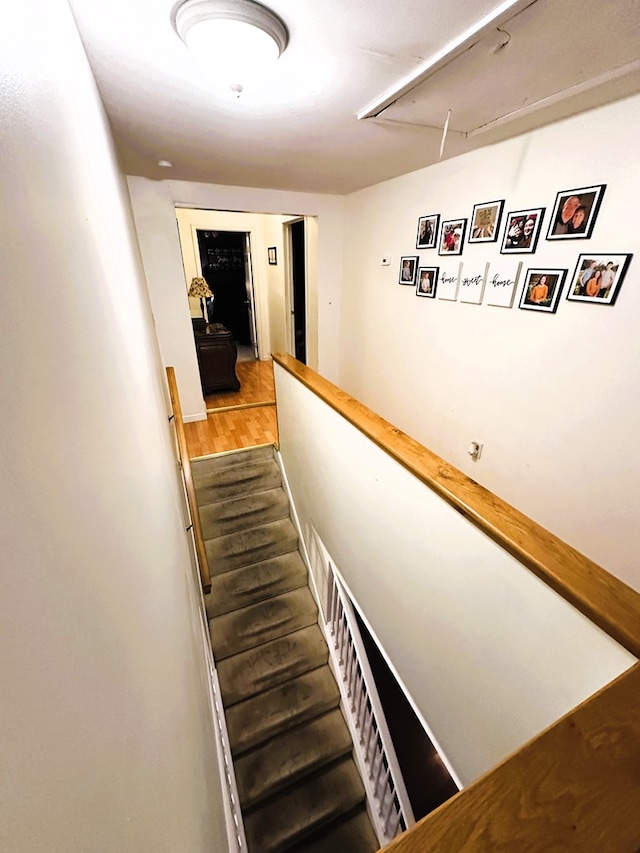 hall with wood-type flooring