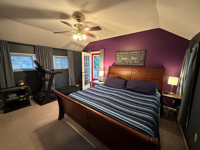 bedroom with carpet floors, ceiling fan, and lofted ceiling