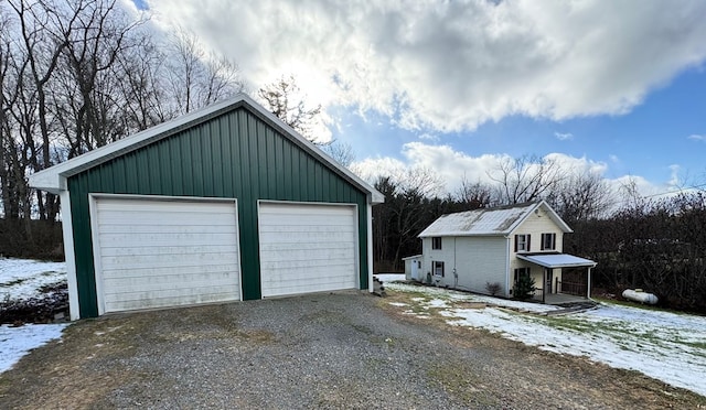 view of snow covered garage